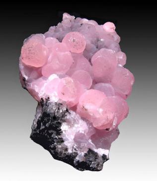 Lovely Smithsonite - this pink one is really pretty! The image is from The MinDat website, taken by Danny Jones.