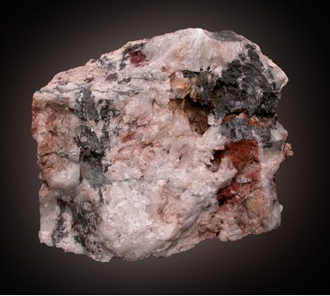A photo of a specimen of Wolframite form Drakelands Mine in Devon, taken by Paul De Bondt from the MinDat website: http://www.mindat.org/photo-471032.html